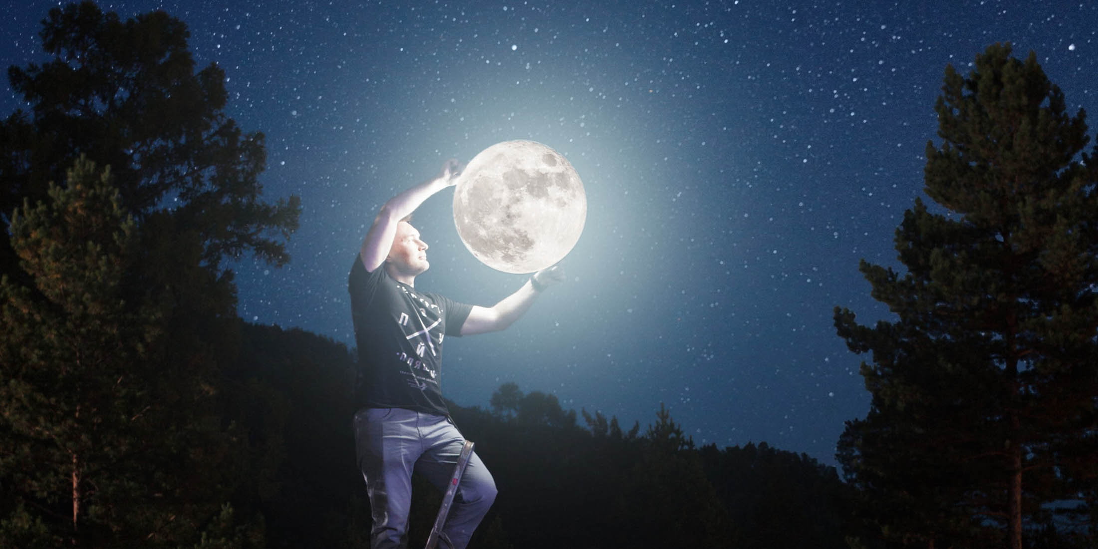 picture of guy holding the moon